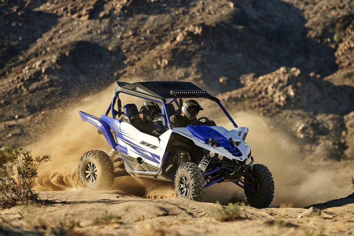 YXZ1000R Racing Blue as depicted is equipped with genuine Yamaha accessories.